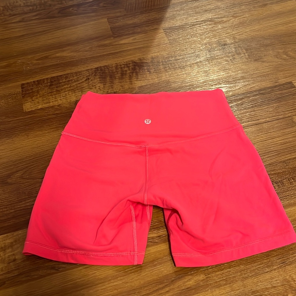 Lululemon lipgloss pink, 4 inch inseam biker shorts. Barely worn.